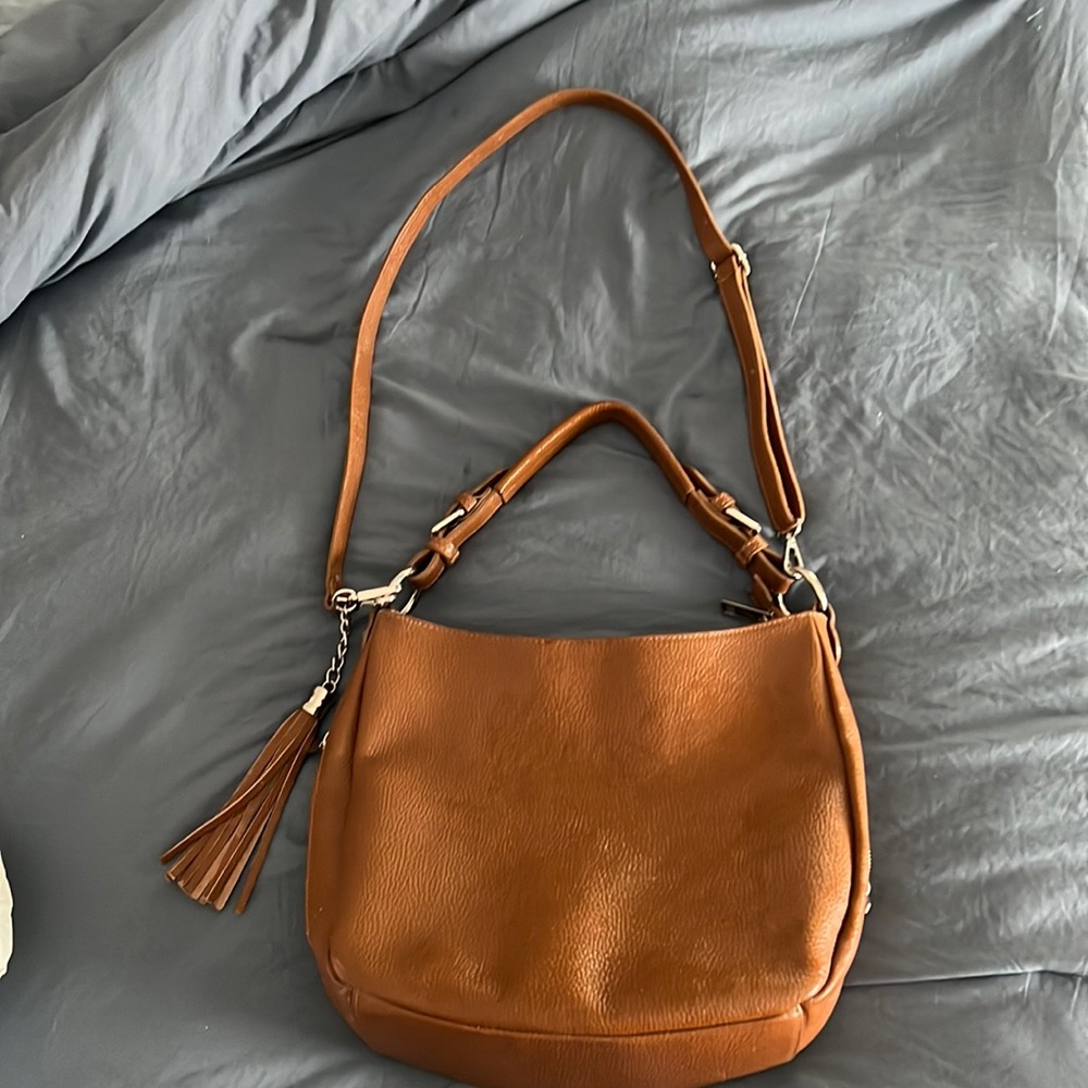 Brown crossover shoulder handbag